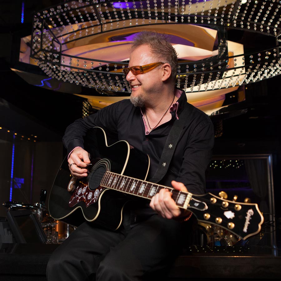 Tim Ambler performing classic hits and original music worldwide